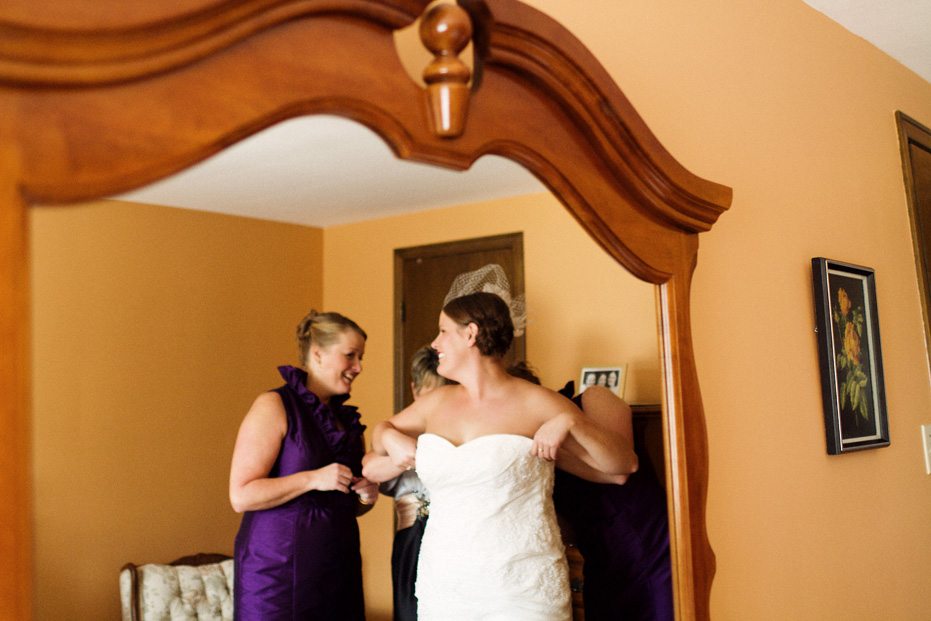 the bride gets dressed with her family in Waterloo, Ontario