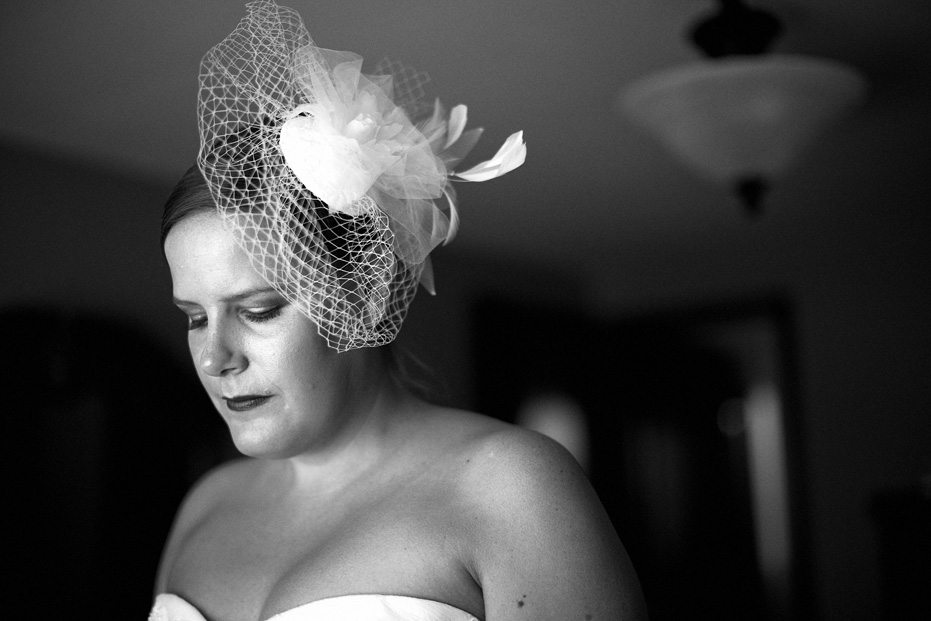 a quiet moment as the bride gets ready as shot by Kitchener wedding photojournalist