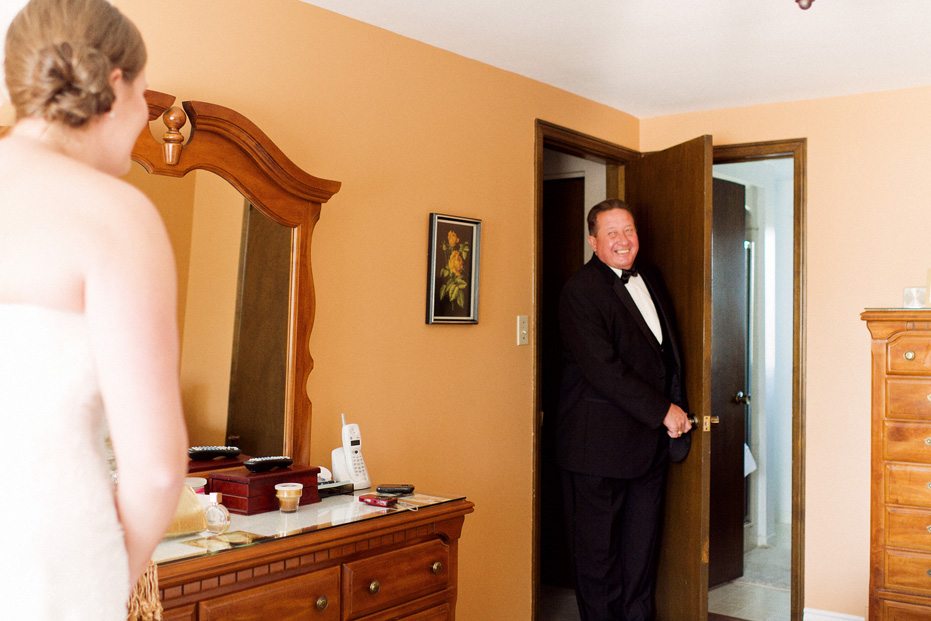 the father of the bride sees his daughter the first time on the morning of her wedding day.