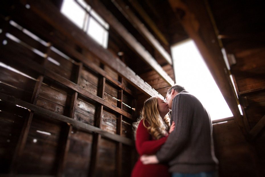 a kiss in a rural Ontario setting by Toronto wedding photojournalist