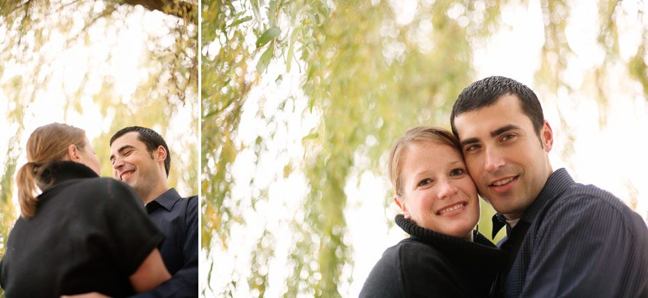 an engaged couple under a willow tree by Toronto wedding photographer