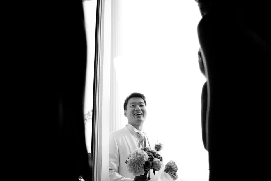 The groom must prove he's deserving of the bride as shot by Toronto wedding photojournalist