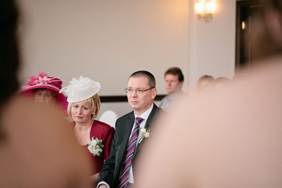 The groom's parents emotional moment at their son's wedding