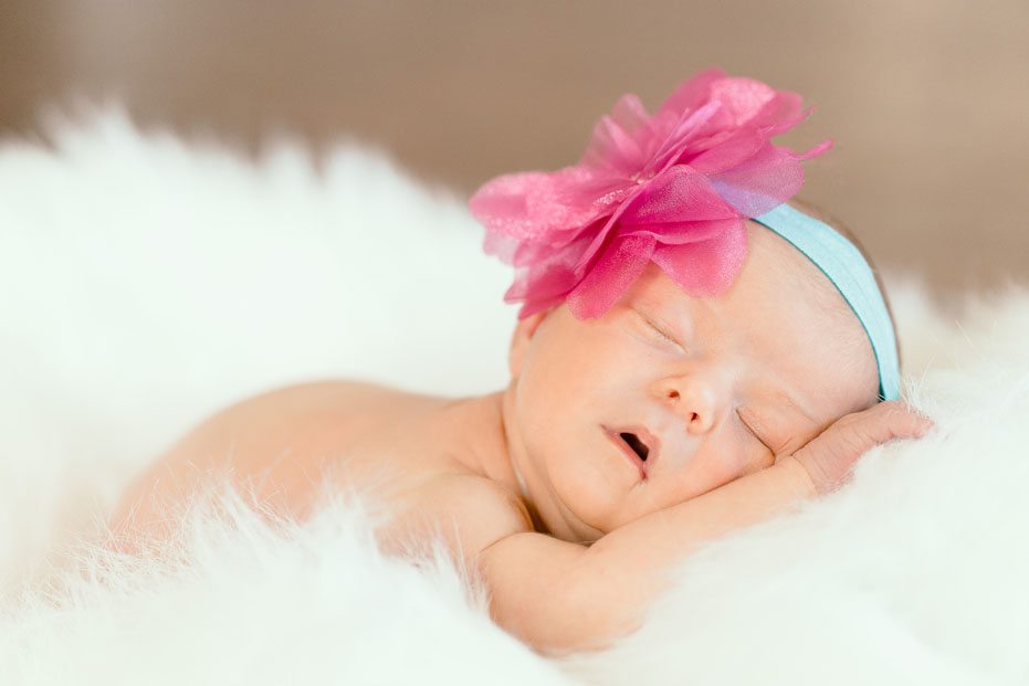 a cute portrait of a newborn baby girl by Kitchener-Waterloo photographer