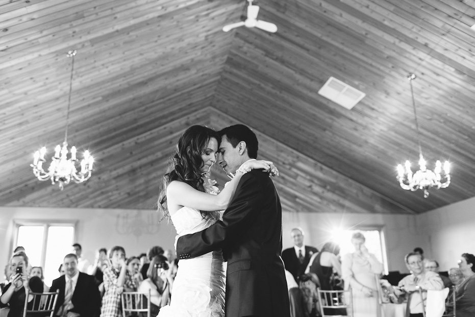 the bride and groom dances to their first dance at the Waterstone Estate and Farms